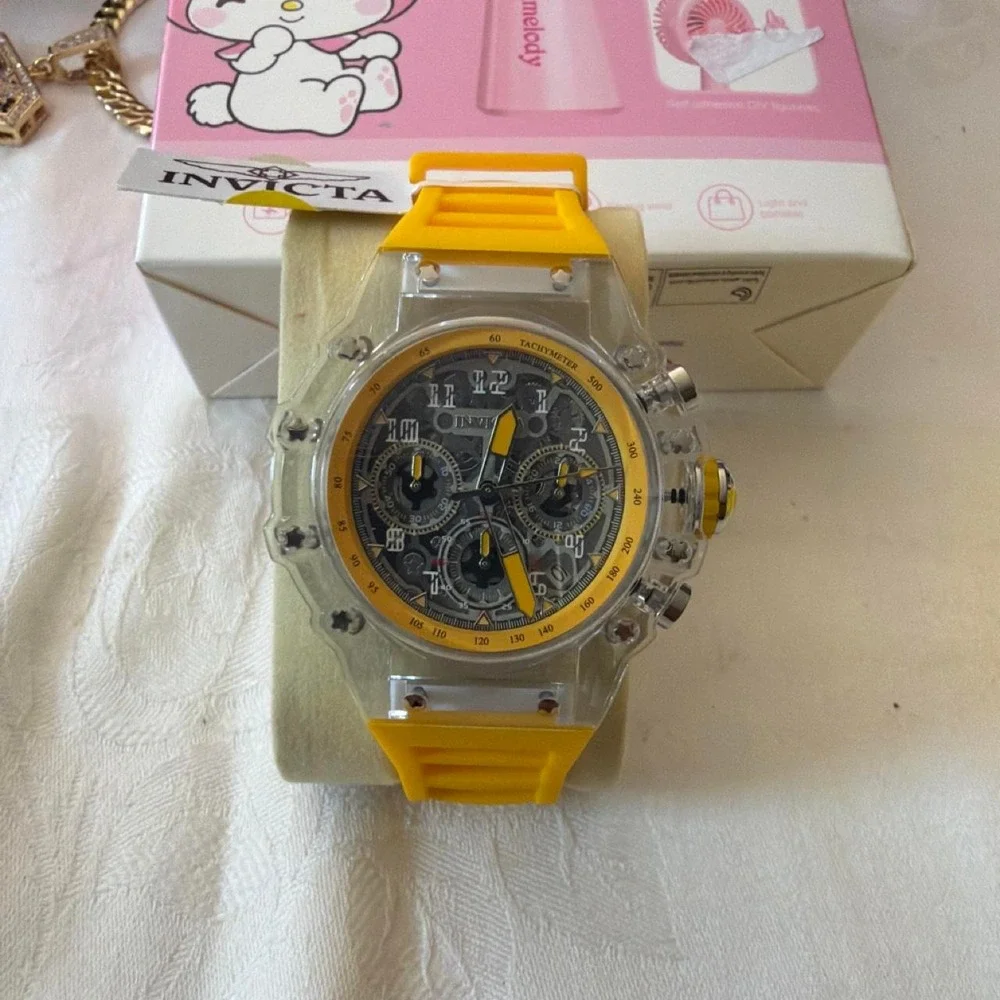 Invicta blue watch with white stripes on the band Blue, Red, yellow, Green